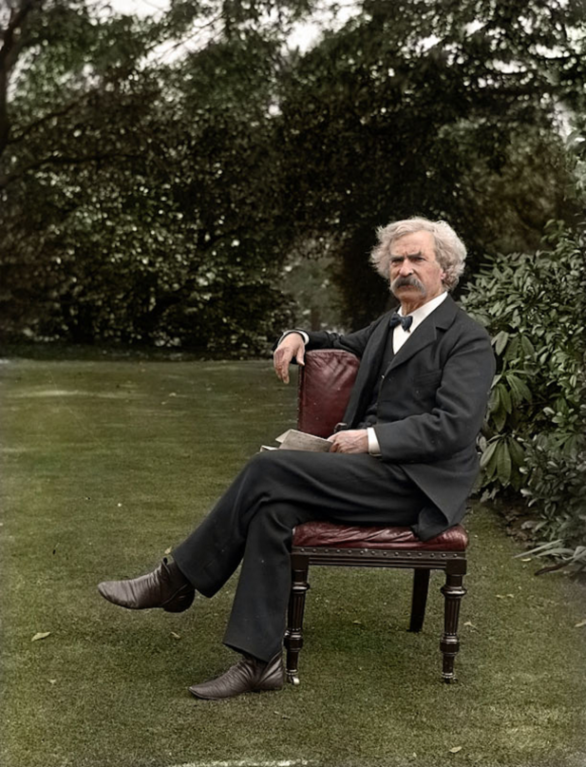 Mark Twain in his garden c.1900. (Colorized).
