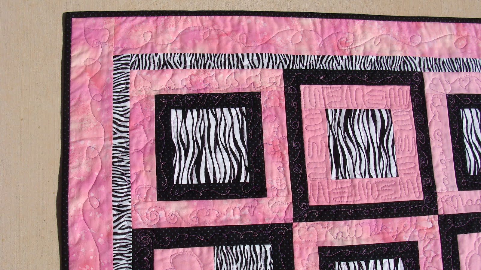 cinnamon holiday pink and zebra baby quilt for Kali