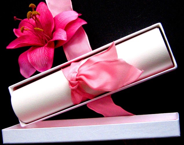 Sweet and simple roll your invite tie it with a pretty bow and pop it in