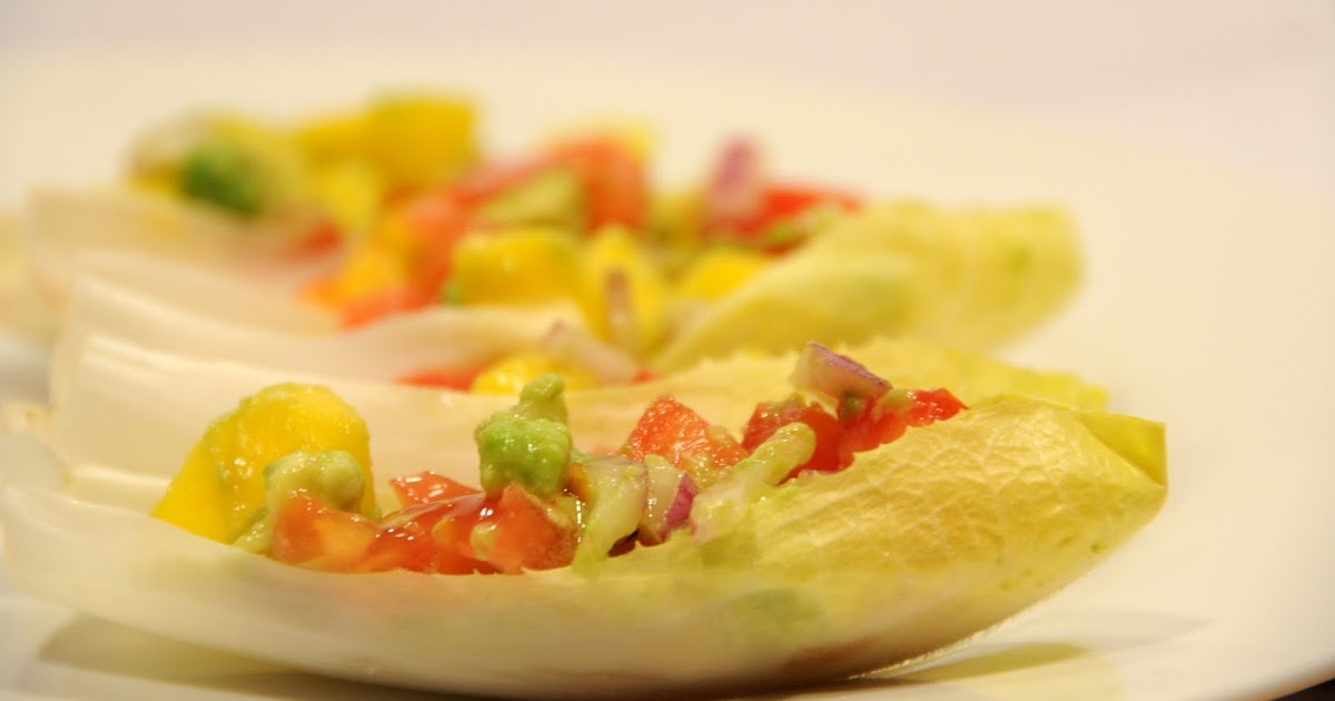 deliciously organized endive leaves stuffed with mango salsa