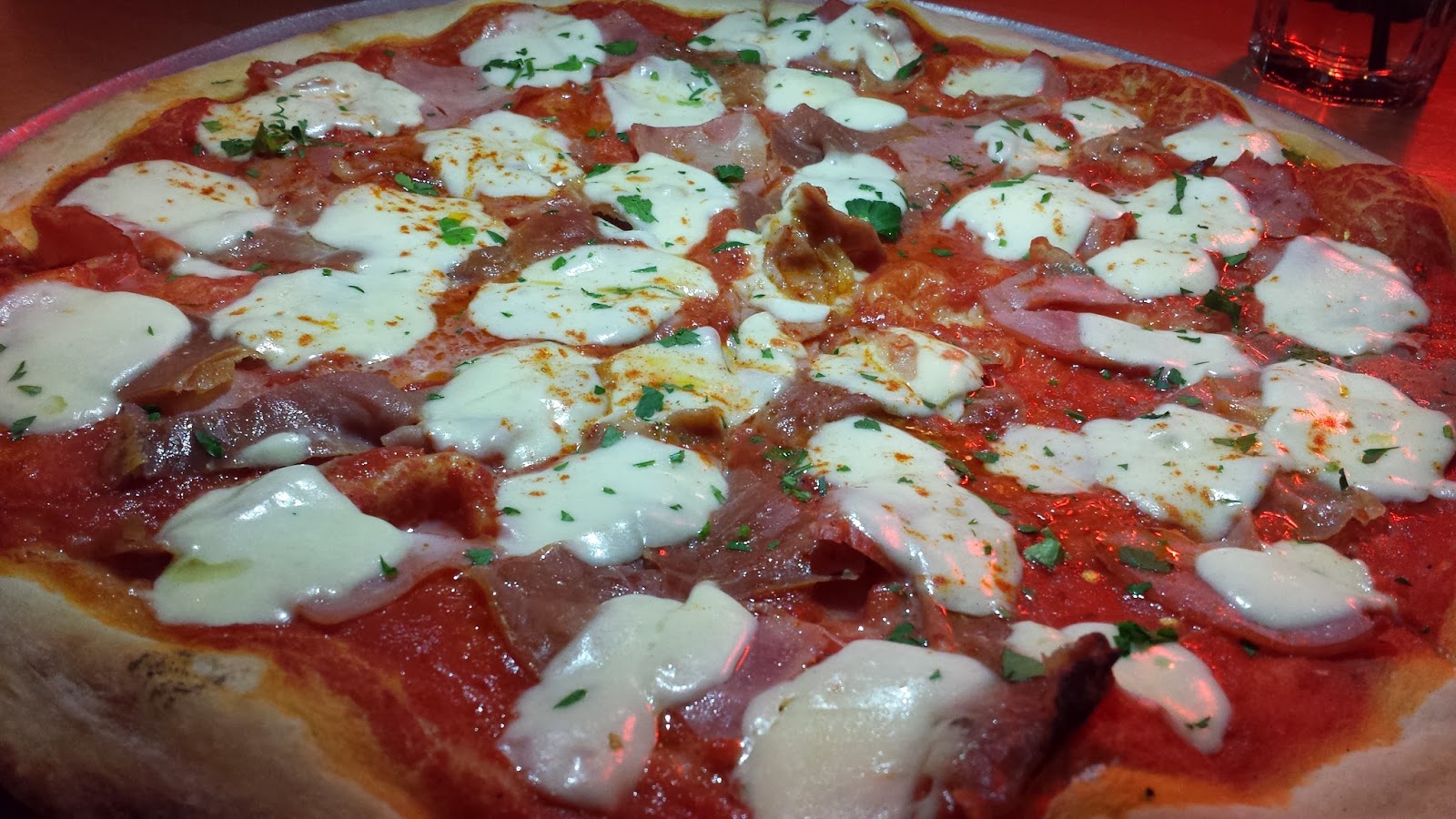 Eat Your City Tony's Pizza Palace Edmonton, AB tossing and serving