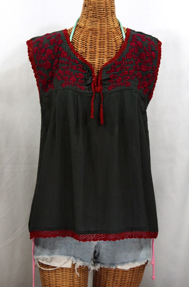 http://www.sirensirensiren.com/shop/new!-embroidered-peasant-tops/marbrisa-sleeveless-peasant-blouse/embroidered-sleeveless-mexican-blouse-marbrisa-charcoal-grey-maroon