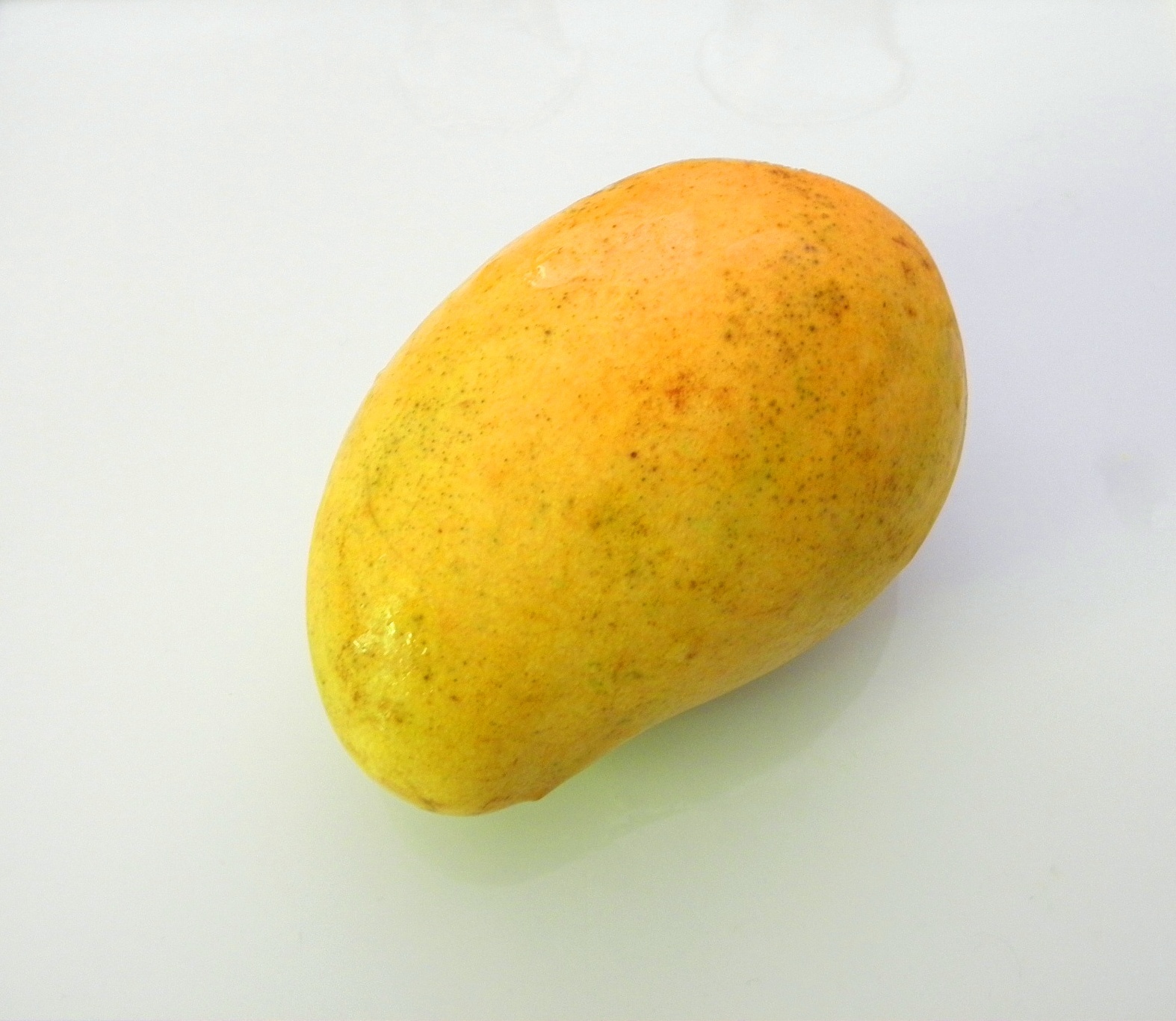 Good Things by David Enjoying a Mango