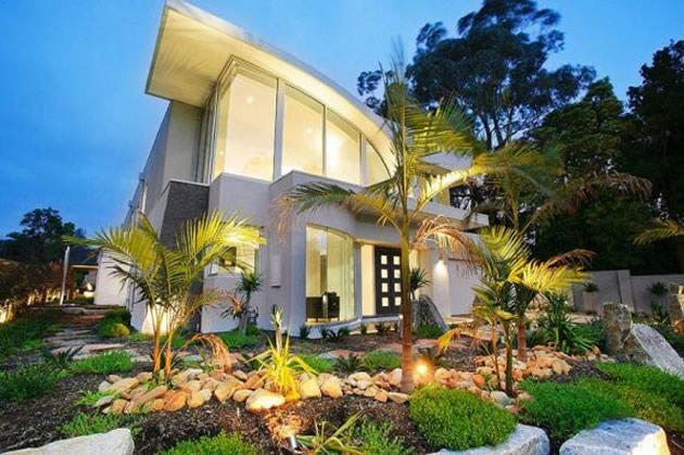 House in a modern design with a beautiful garden decoration