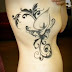 Lily scroll flower tattoo on side body