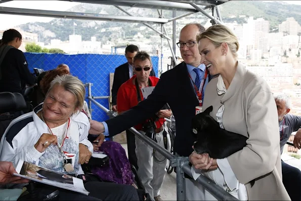 Prince Albert and Princess Charlene visited an association for people affected by traffic accidents on May 23, 2015 in Monte Carlo, Monaco