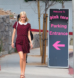 Isabel Lucas  at Pink Tacos Restaurant parking in Los Angeles