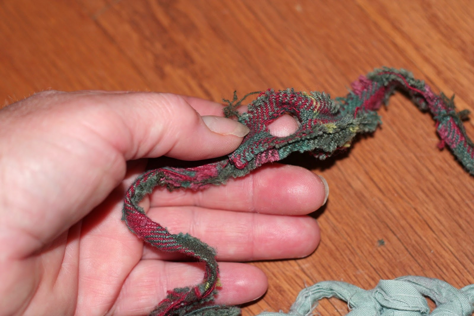 Whispers From Elizabeth Repairing a Rag Rug