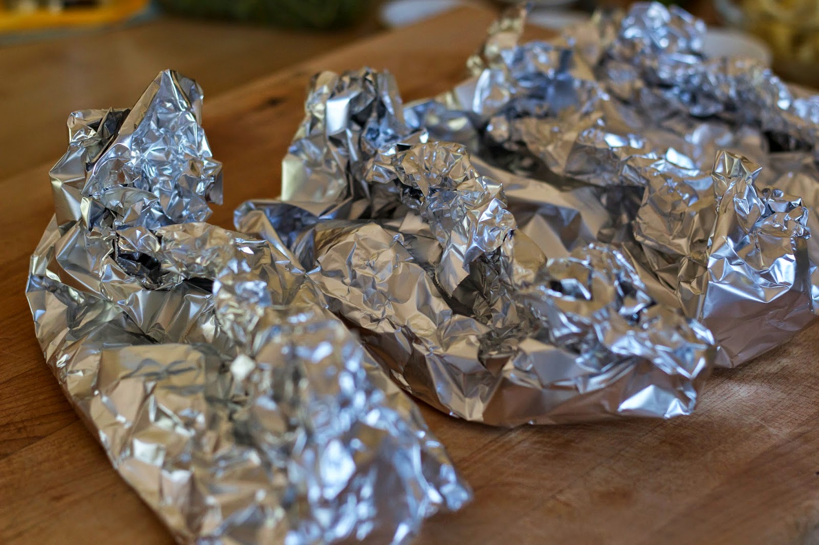 Halibut in Foil with Artichoke Hearts, Tomatoes and Capers