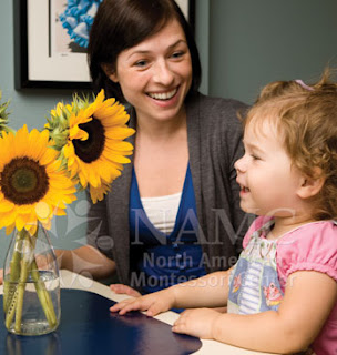 NAMC montessori teacher and girl look at flowers common montessori teacher common worries