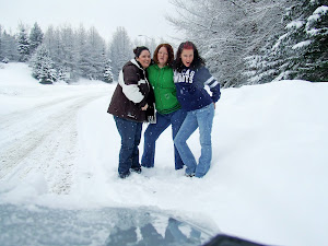 Mom & girls in a snow storm somewhere in New England