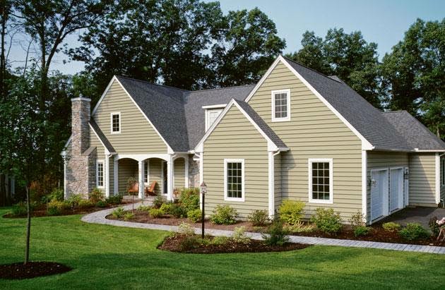 how much does it cost to replace vinyl siding with wood