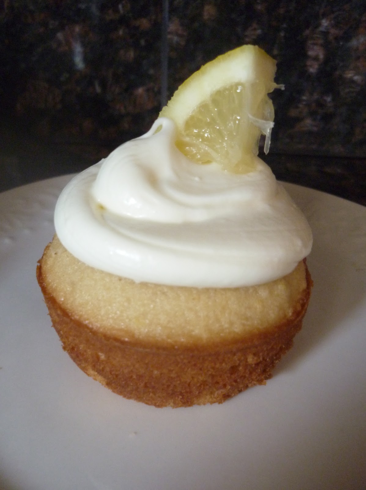 Model Bake Friendly Lemon Cupcakes with a Lemon Cream Cheese Hat