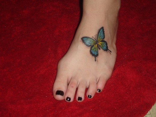 Small Butterfly Foot Tattoo Design for Younger Girls