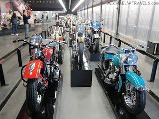 a group of motorcycles on display