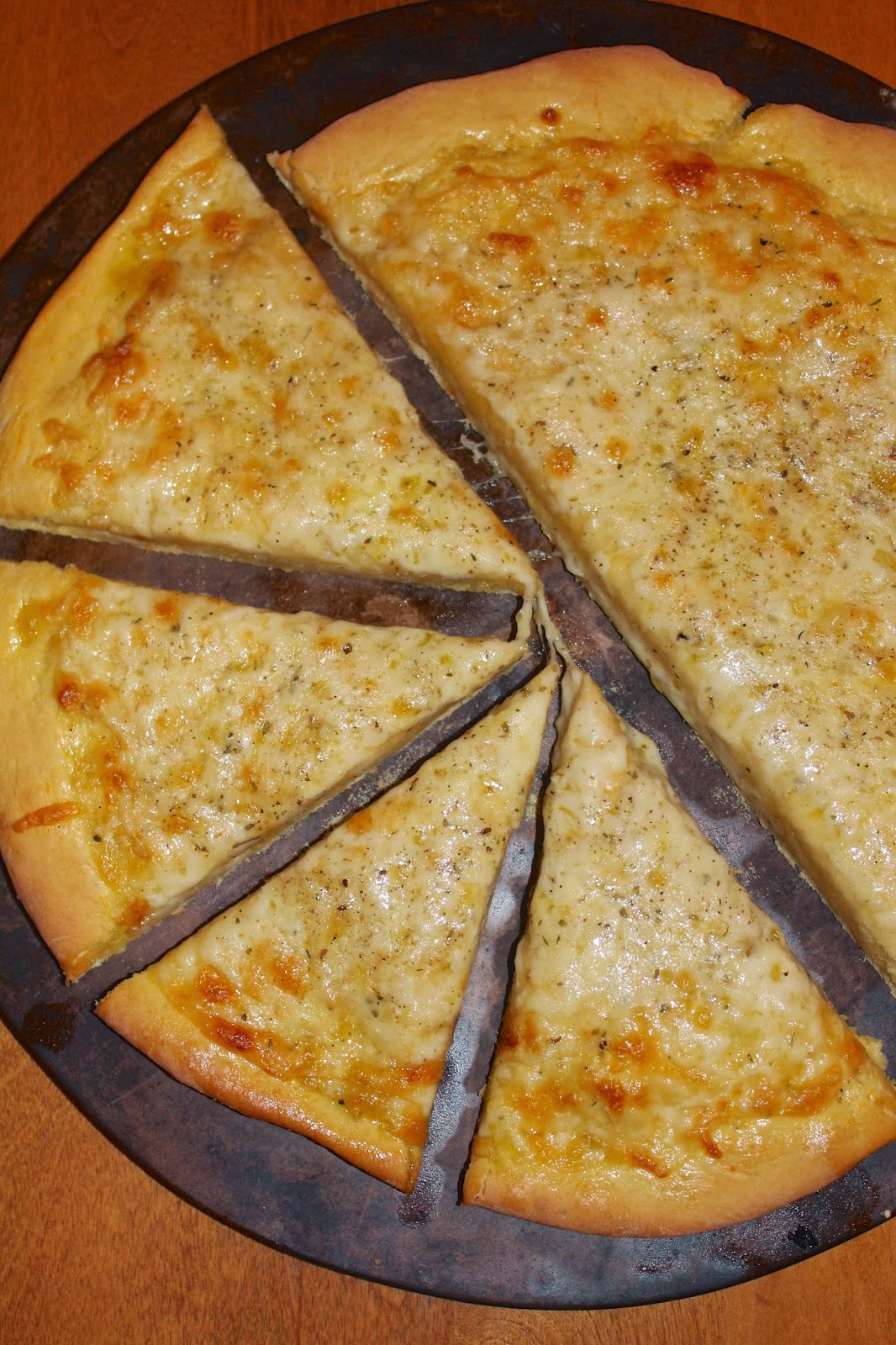 Savory Moments Three cheesegarlic pizza on pumpkin pizza dough