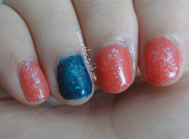 dark blue and pink flakies nails
