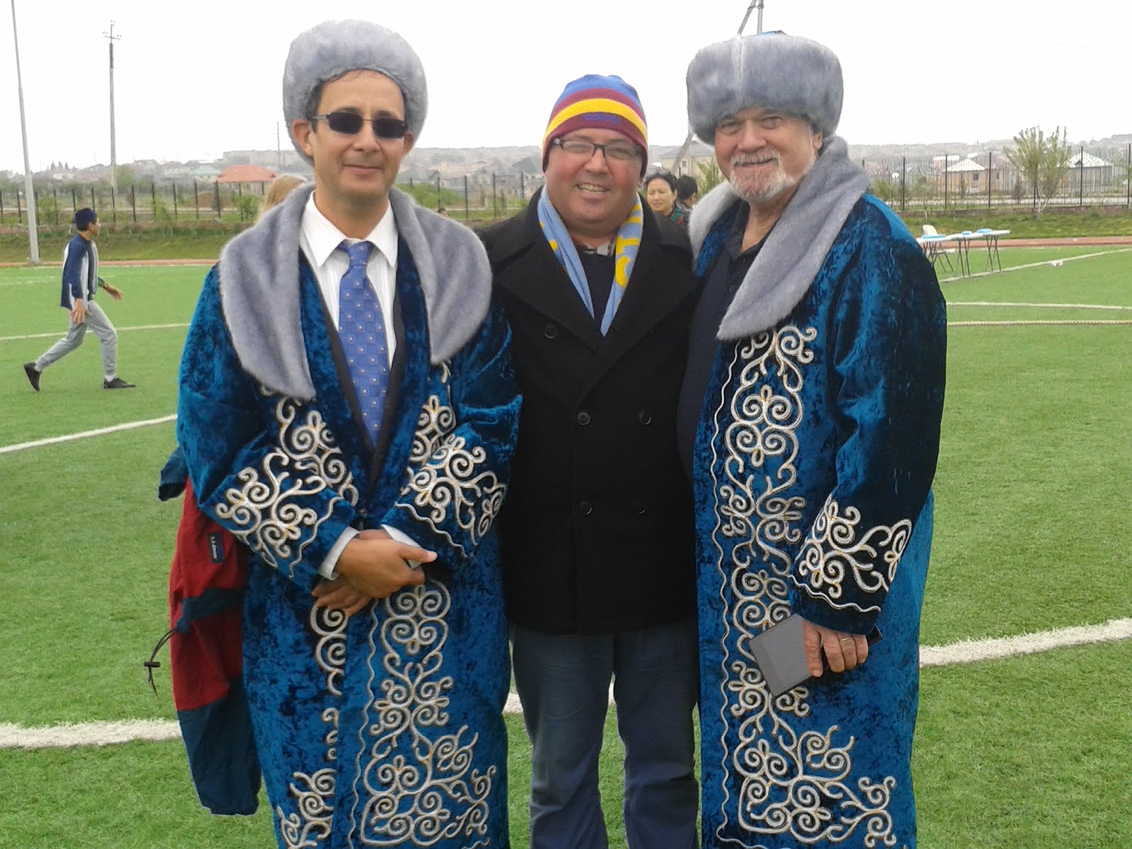 International teachers Yassine and Murray in traditional Kazakh dress