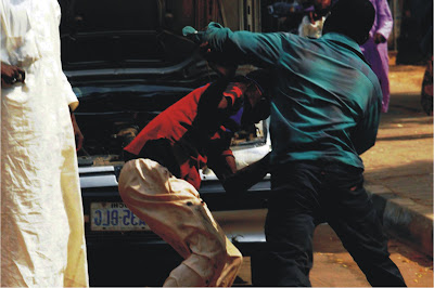 Church workers beat, detain govt officials over N2m tax Brothers+beat+their+mother+lover