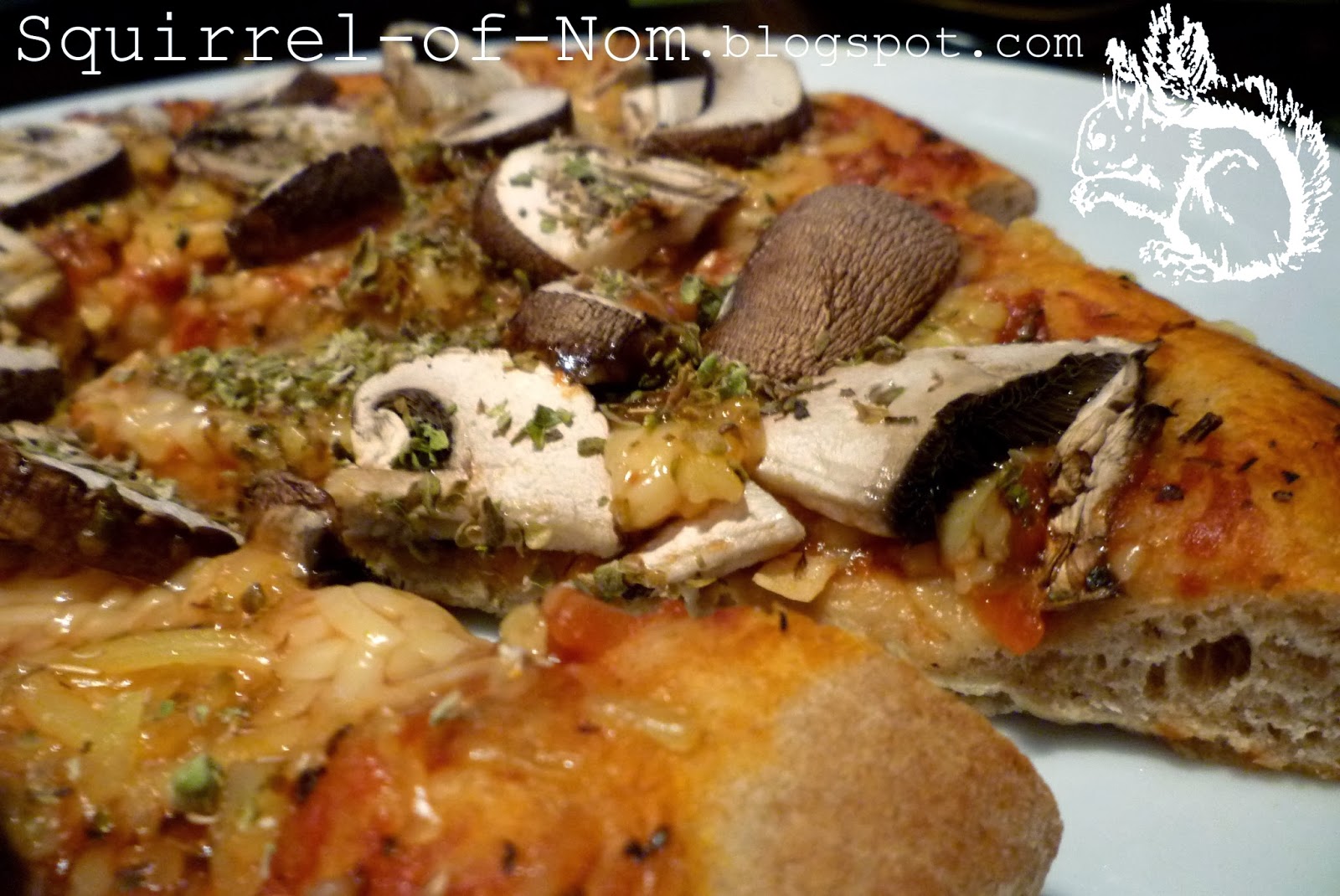 Squirrel of Nom's Tasty Treats Homemade Pizza Homemade Sauce and Dough!