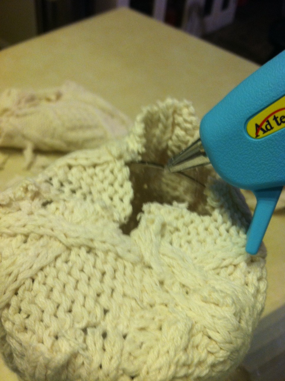 a wee Meenit Cable knit sweater candle holder