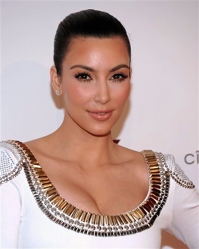 kim kardashian plastic surgery 2011. Kim Kardashian Plastic Surgery