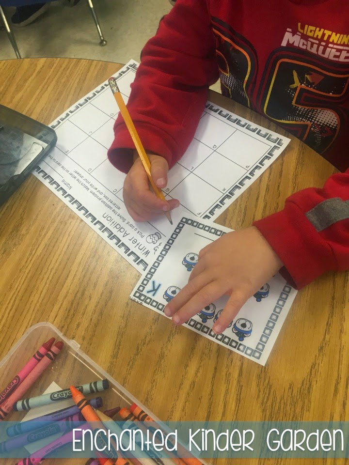 Sometimes Teacher-Authors who have stores on Teachers Pay Teachers get to swap products to test things out in their classrooms -- we like to call this Trade and Grade! This blog post is all about how I was able to try two kindergarten or primary grades resources created by Elyse from for Apples. Click through to read about her fantastic task cards and Winter Print-and-Go literacy resource! This is a photograph of a student completing a math task card activity.