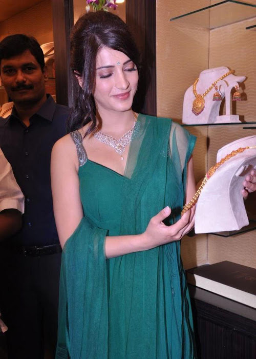 shruti haasan in sleeveless salwar spicy at malabar gold diamonds room launch actress pics