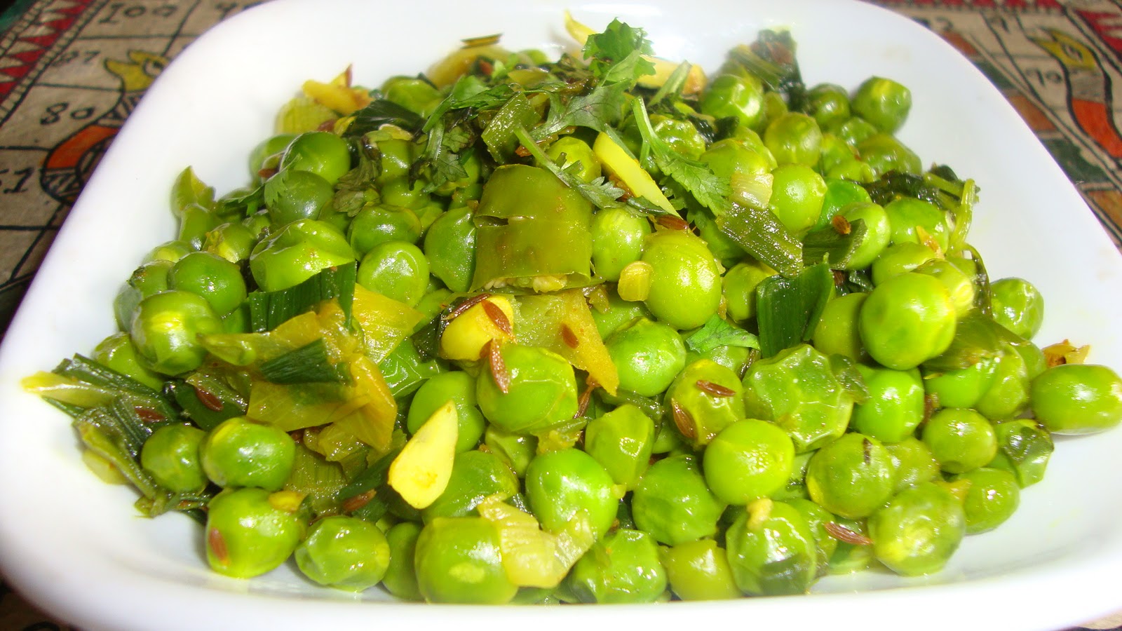 Cooking Delights Green peas with scallions, garlic and ginger