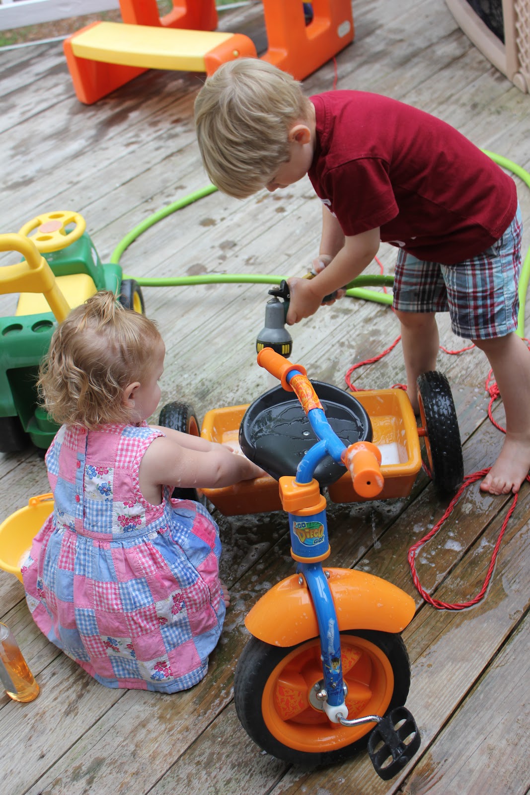 Momma's Fun World Car wash fun with Tricycle