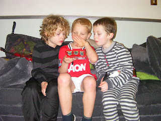 3 boys on a sofa