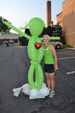 Girls With Sole logo as a balloon sculpture