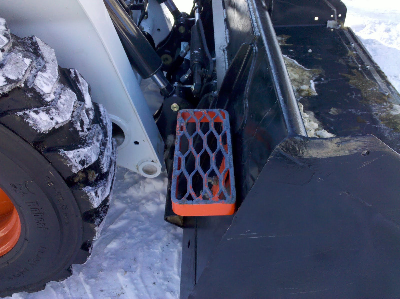 Herbold Metal Werks AgriStep Skid loader bucket steps