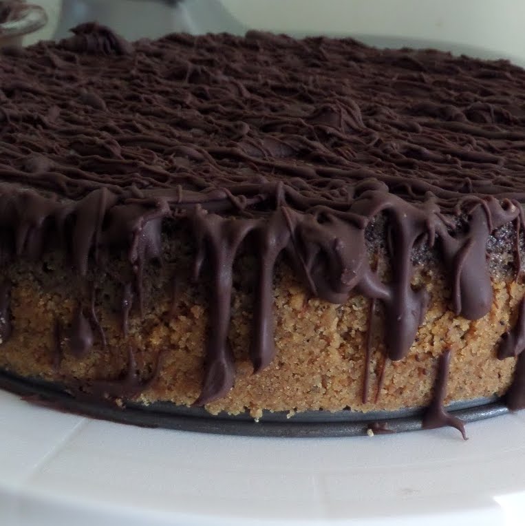 Mocha Chip Cheesecake:  A rich chocolate cheesecake with coffee, mini chocolate chips, and a dark chocolate drizzle.  A perfect birthday cake for my husband.