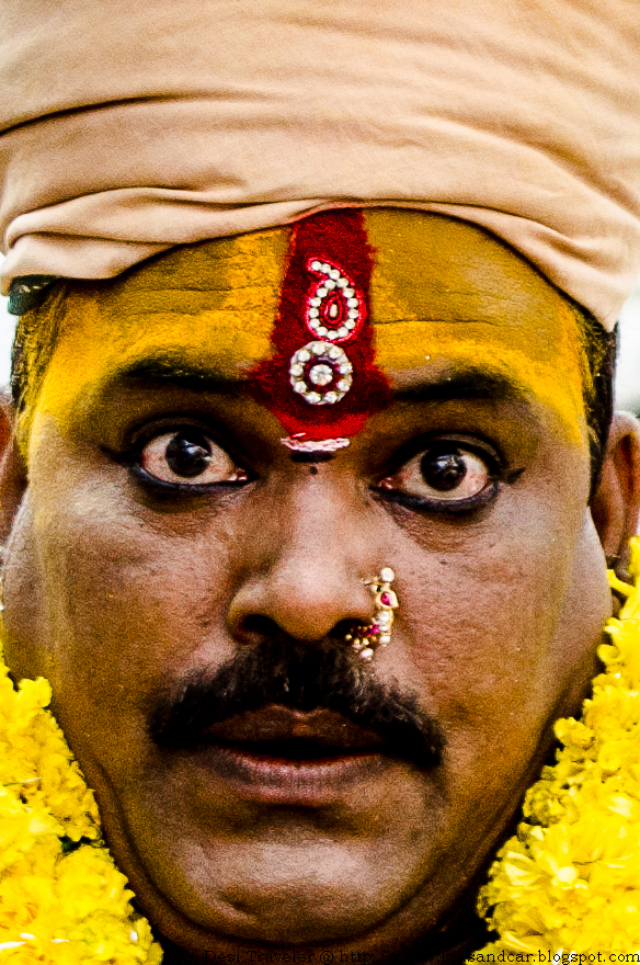 colorful potharaju dancer during bonalu festival