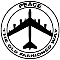 Peace symbol shape, made with a vertically oriented B52 bomber, with the words Peace The Old-Fashioned Way