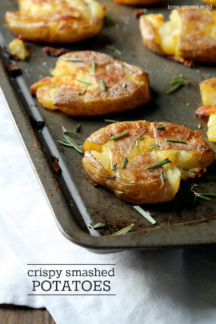 Crispy Smashed Potatoes taste just like a fried hash brown, but way healthier and way more delicious! A great side dish idea! LoveGrowsWild.com #recipe #potato #sides