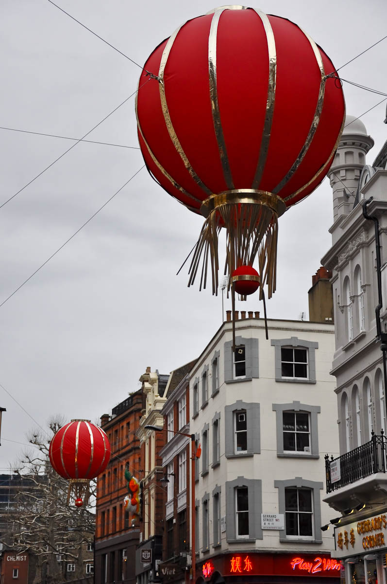 Red baloons, Chinatown, London, England