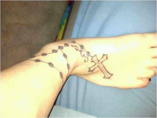 3. The Different Meanings of Rosary Tattoos - wide 1