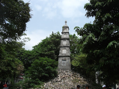 Old structures on the pavement surrounding the Hoan Kiem Lake