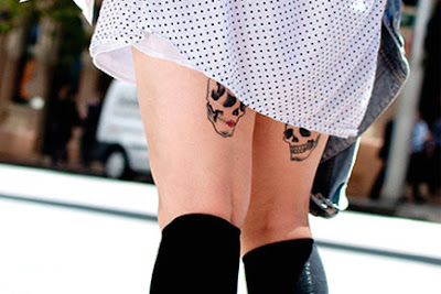skull tattoo on legs