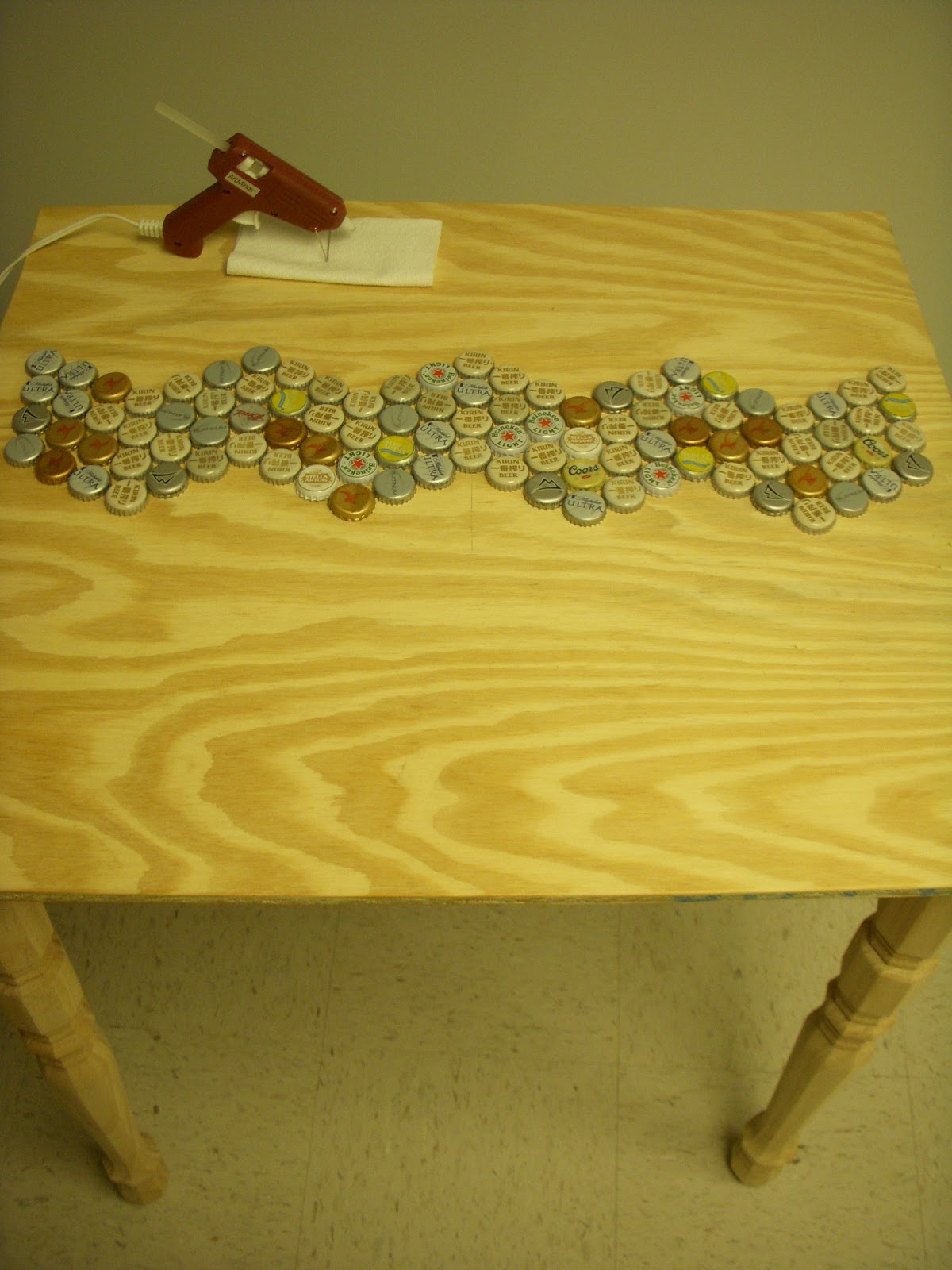 Who'sits and What'sits Beer Bottle Top Table