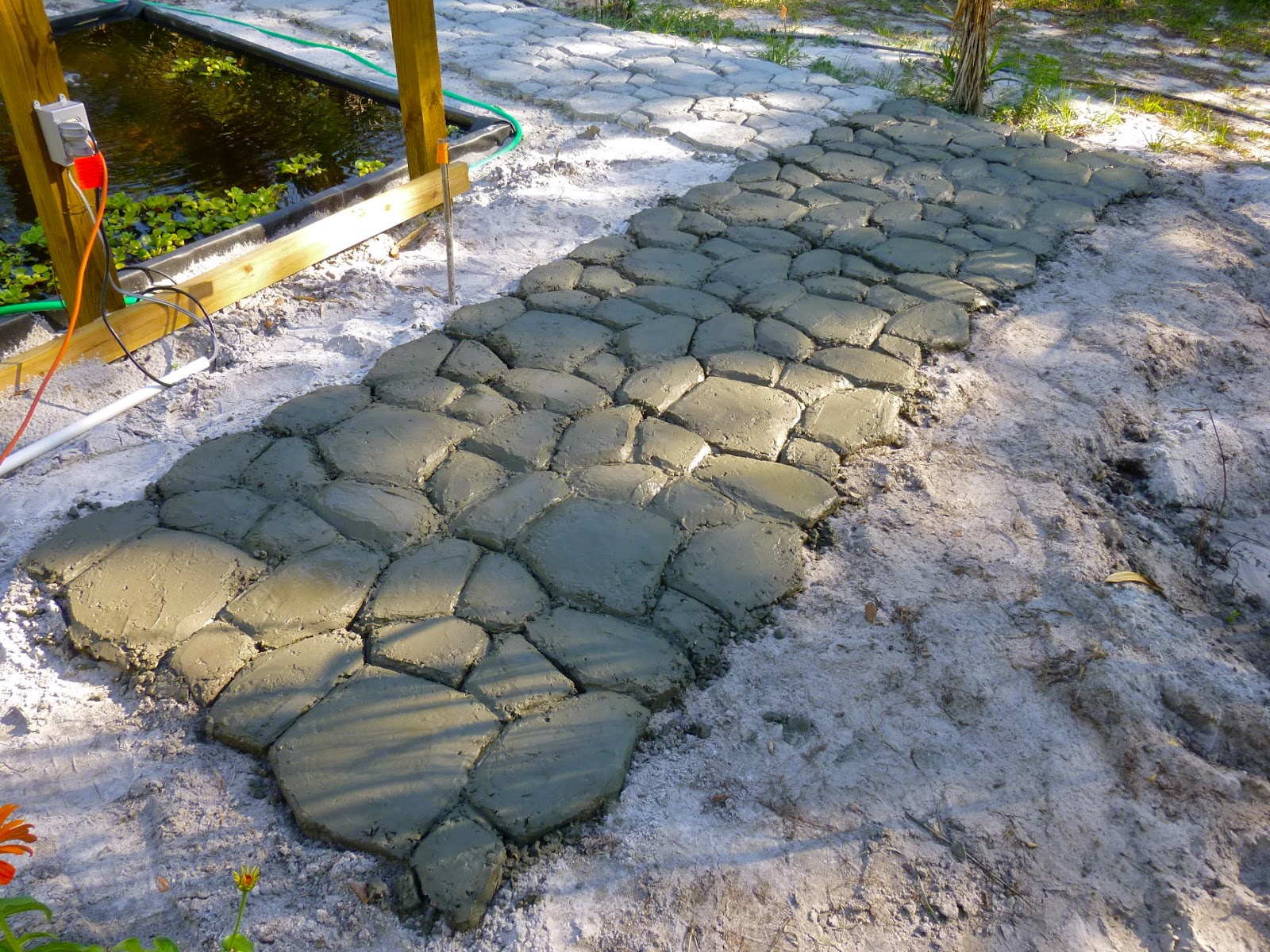 concrete-koi-pond-pouring.jpg