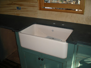 cast iron white sink, stone countertops, https://huismanconcepts.com/