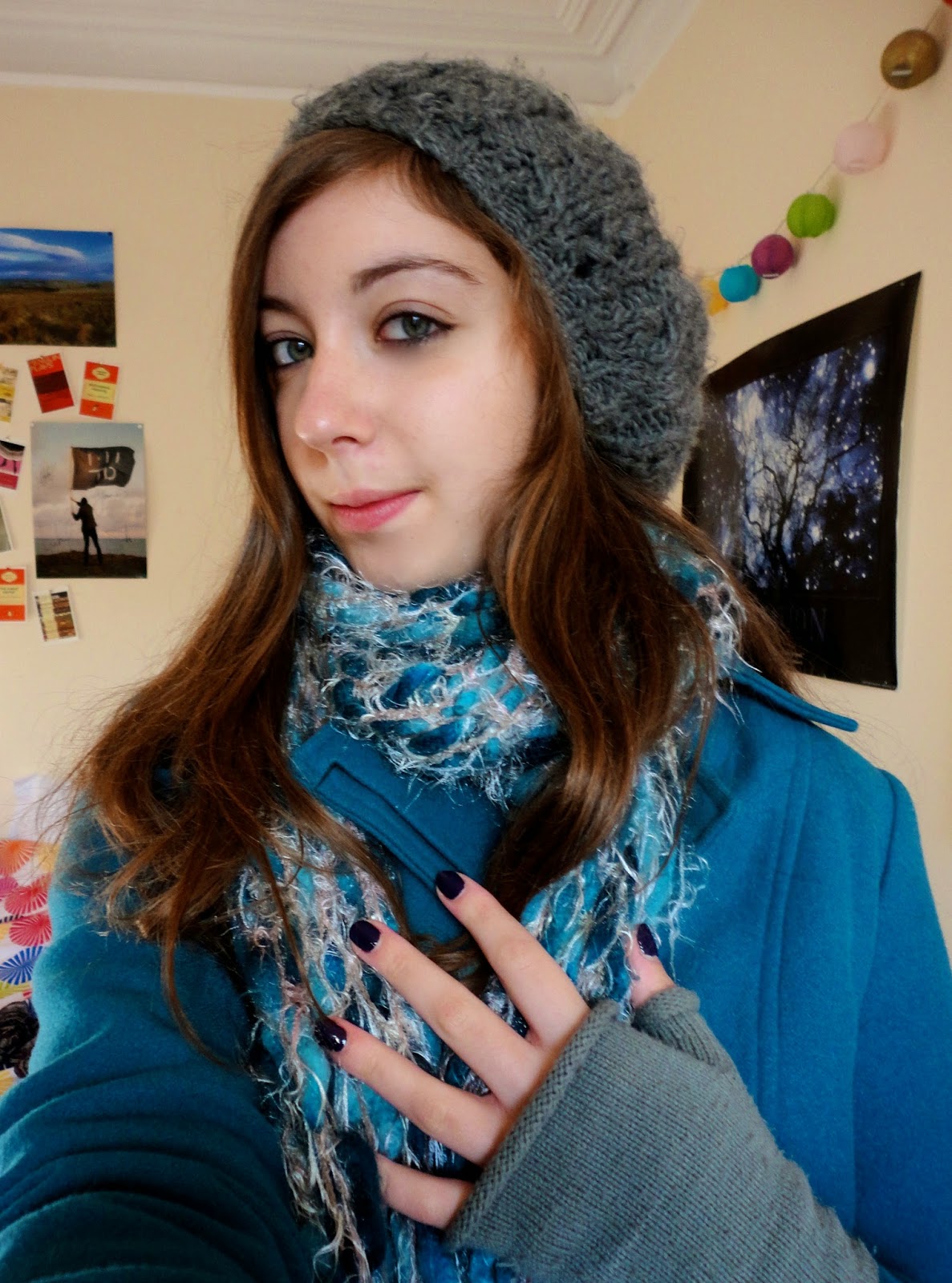 grey winter hat and fingerless gloves with blue scarf