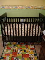 Crib with Quilt