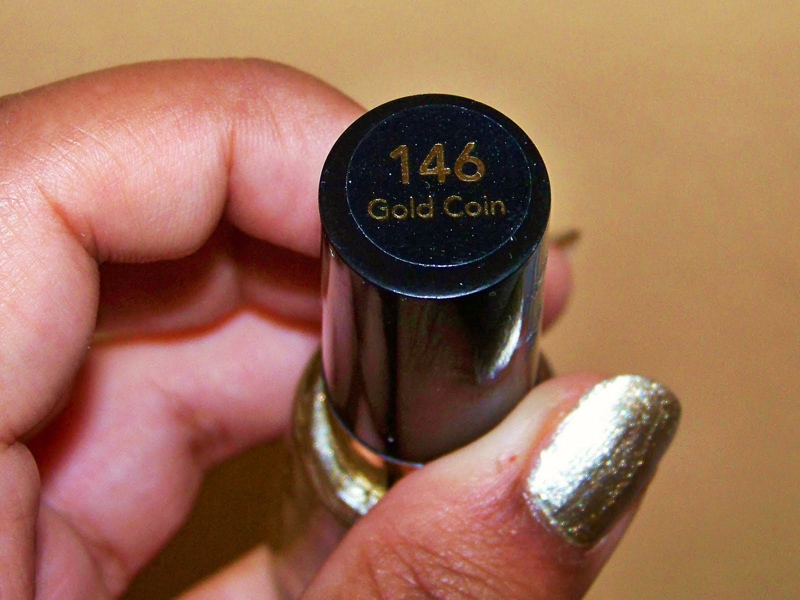 4. "Revlon Gold Coin Nail Polish Swatch and Review" - wide 1