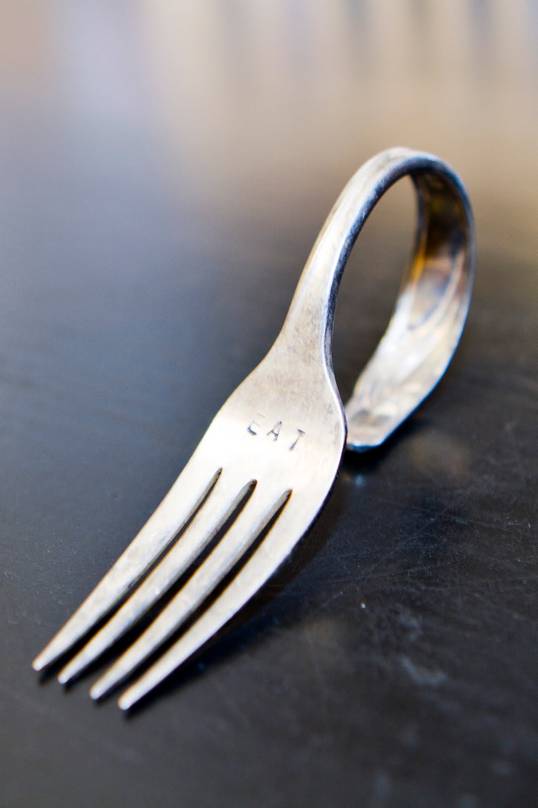 Step 4 Using your mold, guide the fork handles around the pipe using clamps to hold onto the