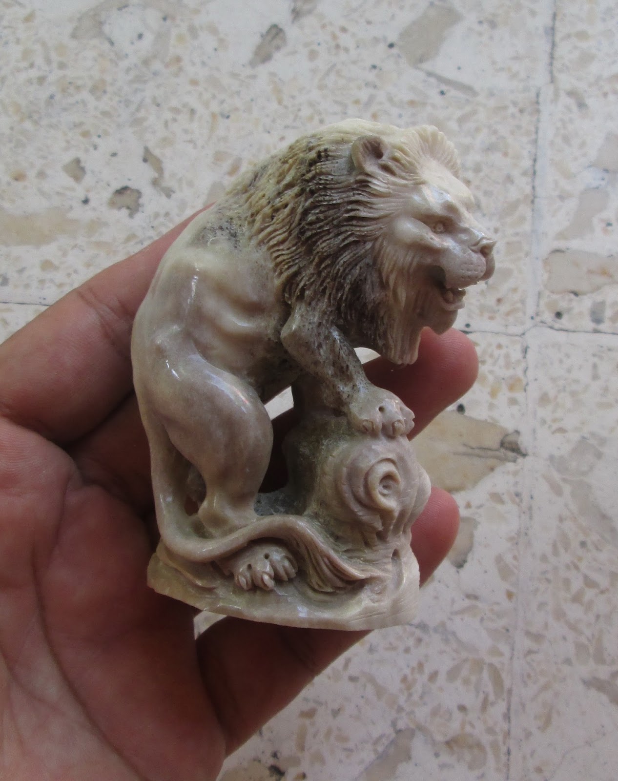 Lion Carving Statue in Caribou Antler Lion Carving Statue in Caribou Antler