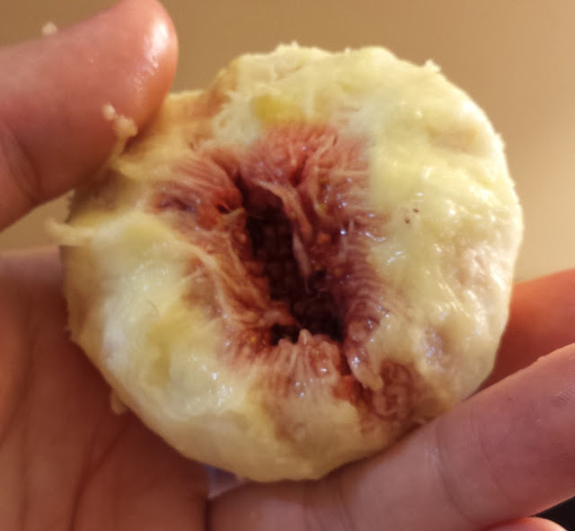 a ripe fig, skinned